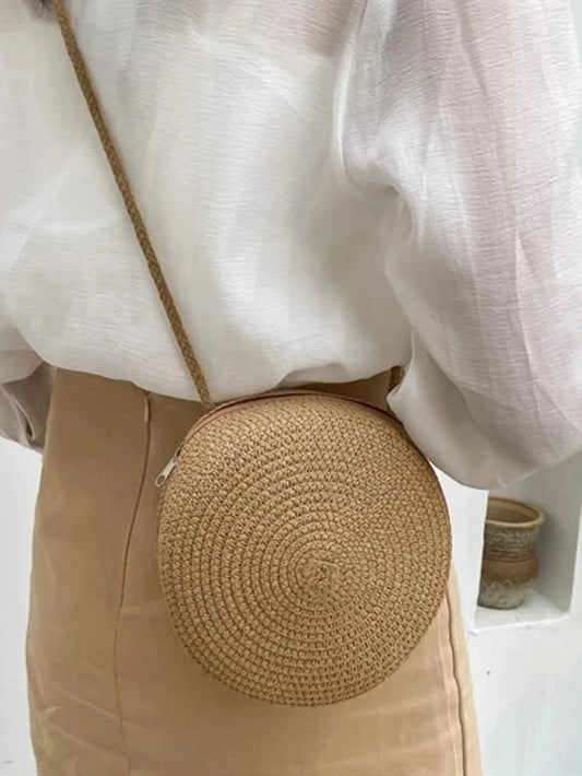 Bolso redondo con asas