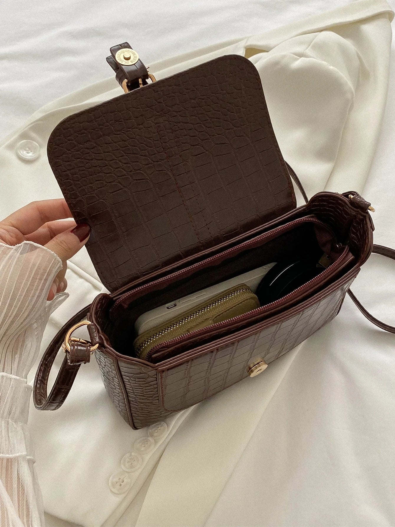 Bolso cruzado con estampado de rombos