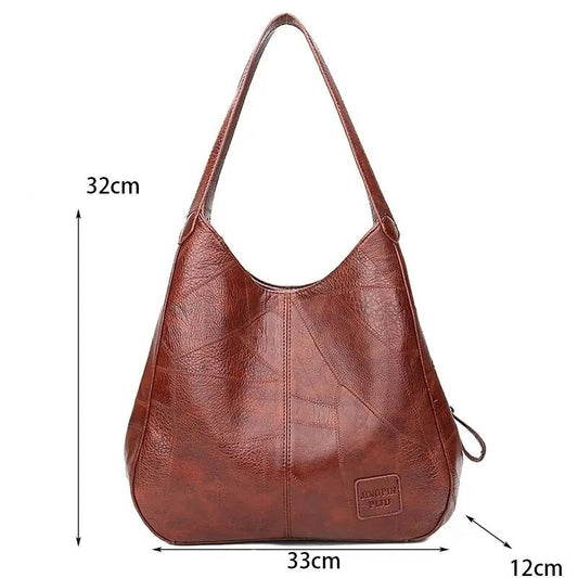 Bolso grande con correa cruzada