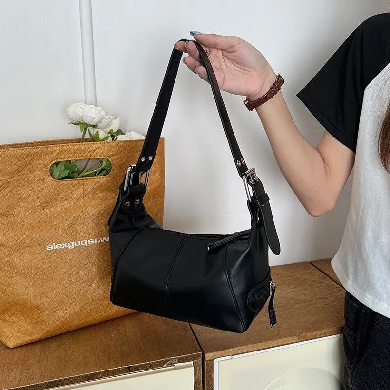 Bolso bandolera con detalles