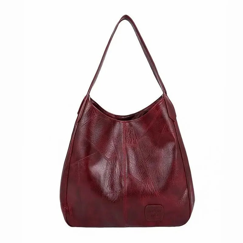 Bolso grande con correa cruzada