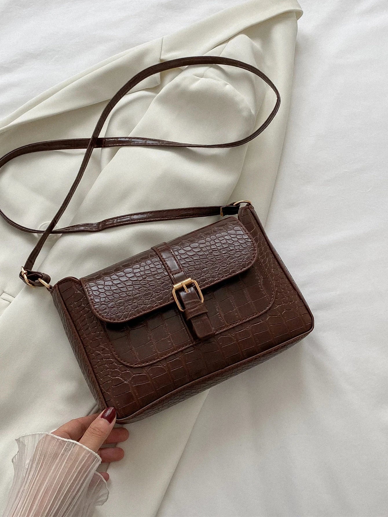 Bolso cruzado con estampado de rombos