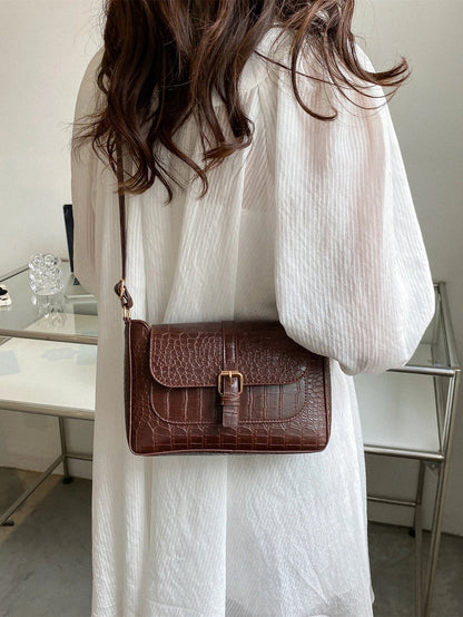 Bolso cruzado con estampado de rombos