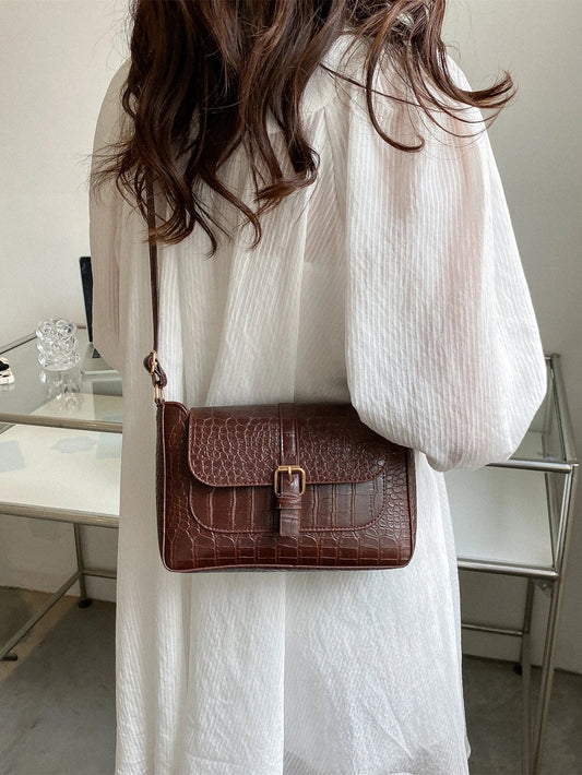 Bolso cruzado con estampado de rombos