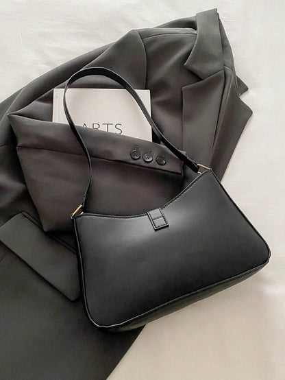 Bolso bandolera con detalles dorados