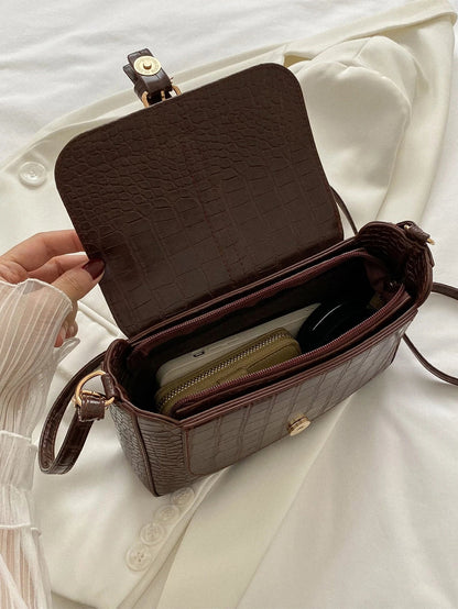 Bolso cruzado con estampado de rombos