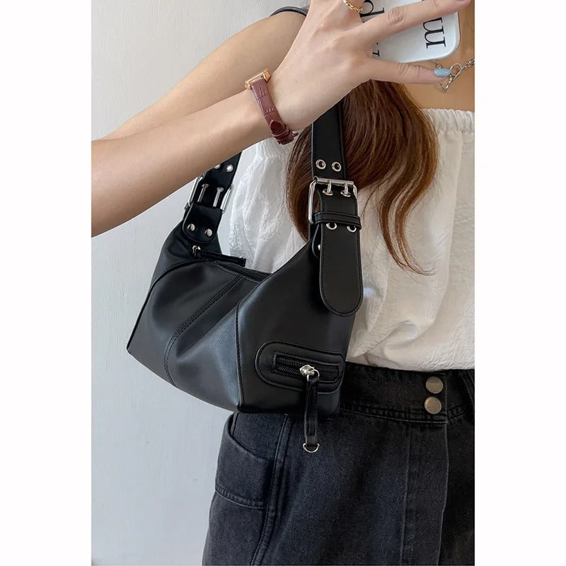 Bolso bandolera con detalles
