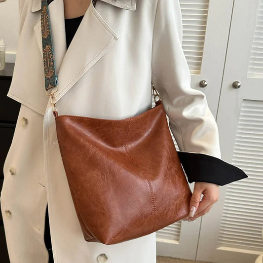 Bolso cruzado estampado