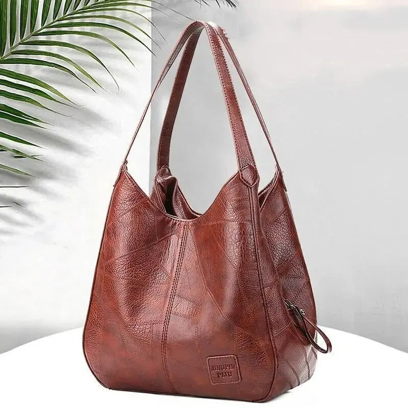Bolso grande con correa cruzada