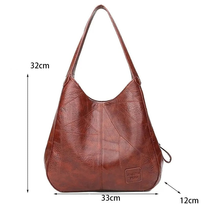 Bolso grande con correa cruzada