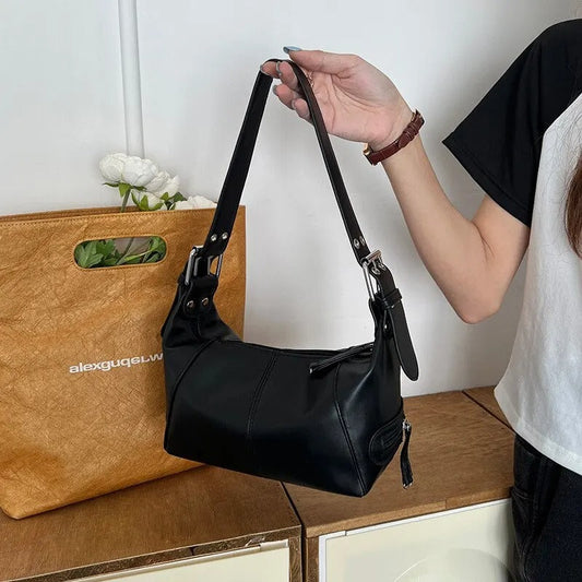 Bolso bandolera con detalles