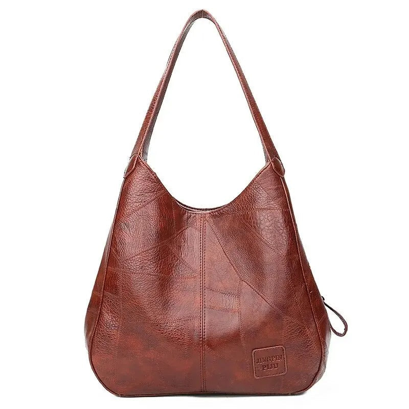Bolso grande con correa cruzada