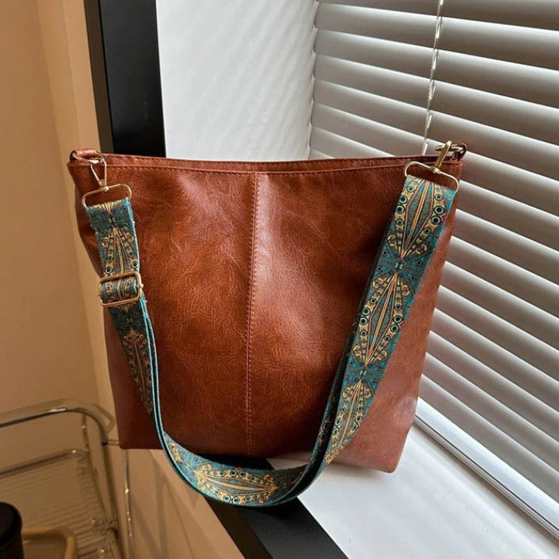 Bolso cruzado estampado