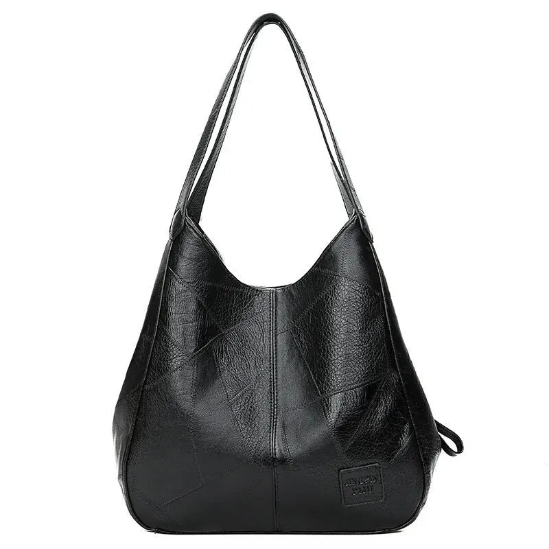 Bolso grande con correa cruzada