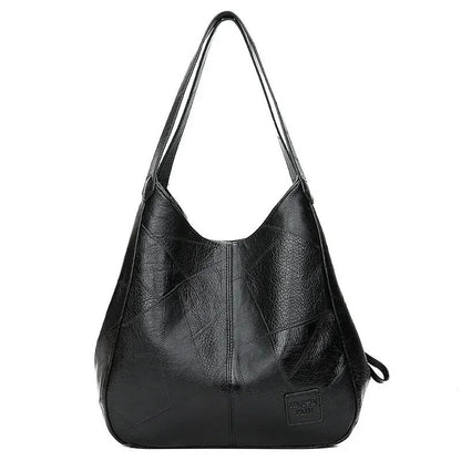 Bolso grande con correa cruzada