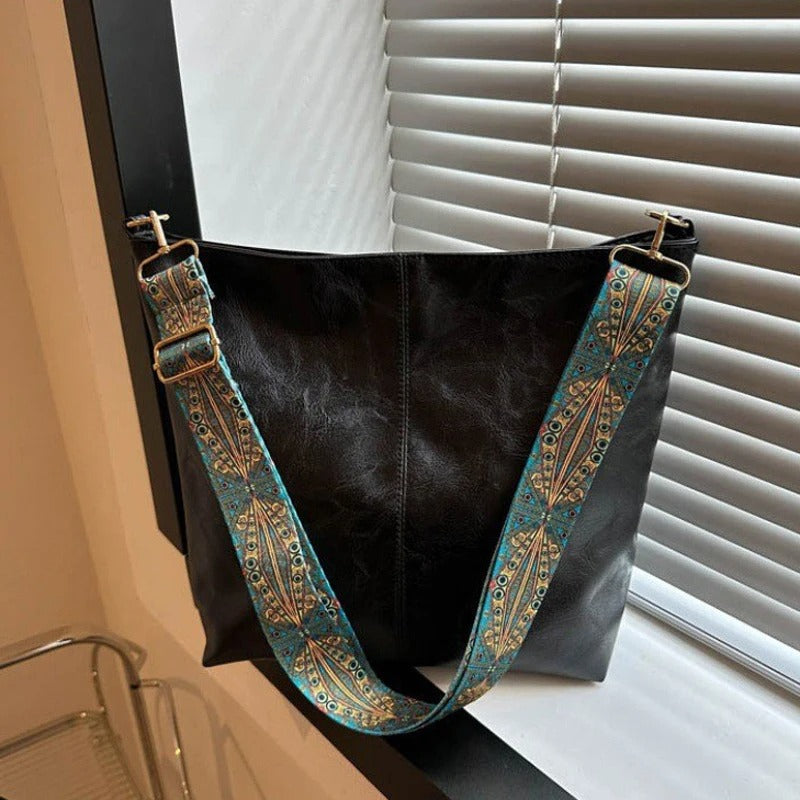 Bolso cruzado estampado